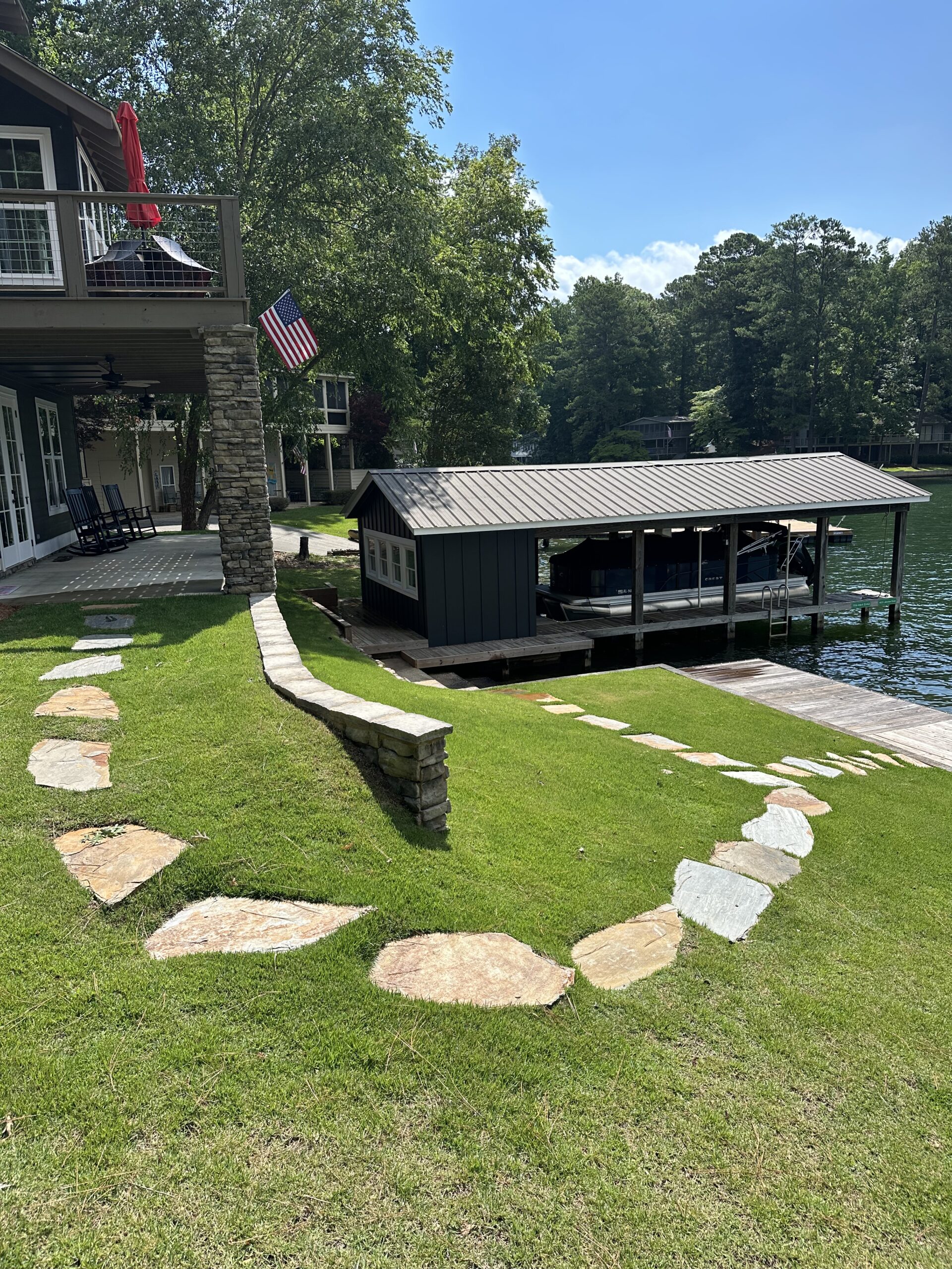 stone steps in hill at lake house retaining wall hardscapes